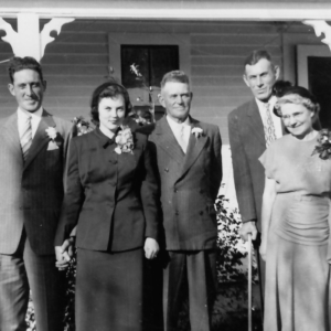 black and white image of don and shirley at their wedding on the farm.