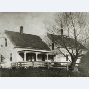 black and white image of the old farmhouse that's now Pumpkin Fine Family Farm in Somerville, ME.