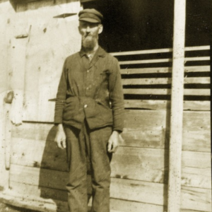 A black and white image of Francis Kennedy one of the family farmers who owned Pumpkin Vine Family Farm.